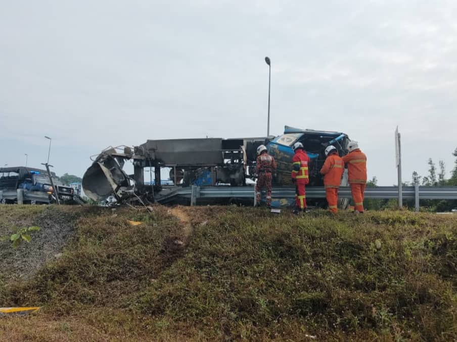 Sarawak firefighters working to extract trapped duo from cement mixer crash