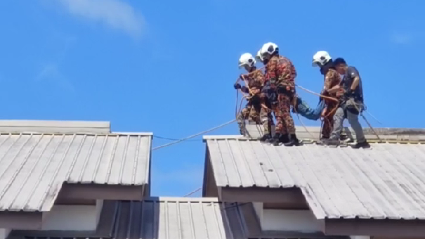 Firefighters rescue man after three days on Sandakan apartment rooftop