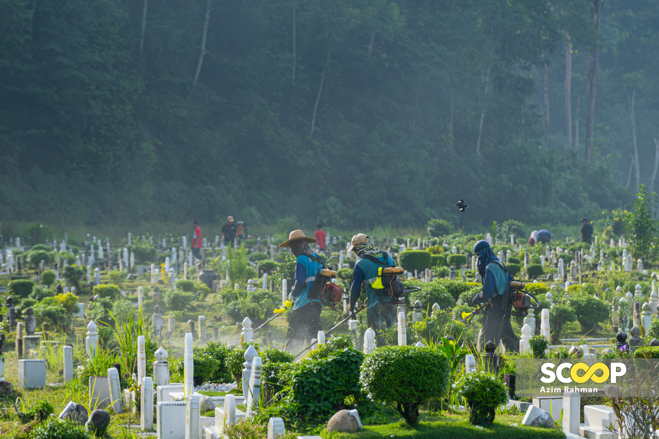 Photo of the day: Tending to traditions with care and charm on cemetery grounds