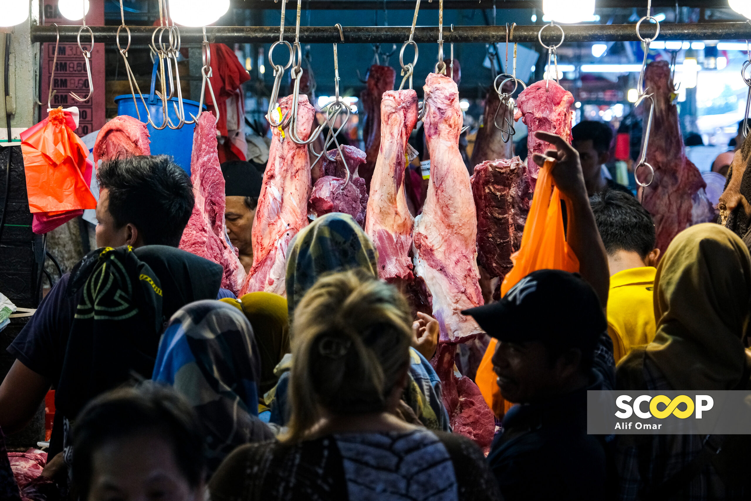 Photo of the day: Crowds flock to Chow Kit Market for Hari Raya meat shopping spree